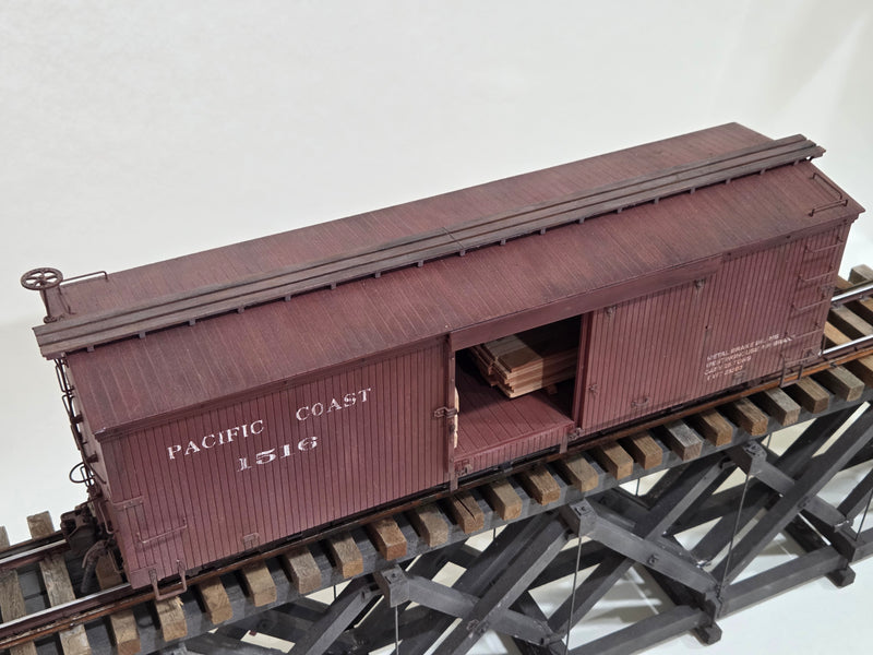 Pre-Owned Bachmann Spectrum 30' Boxcar Pacific Coast with Lumber loads