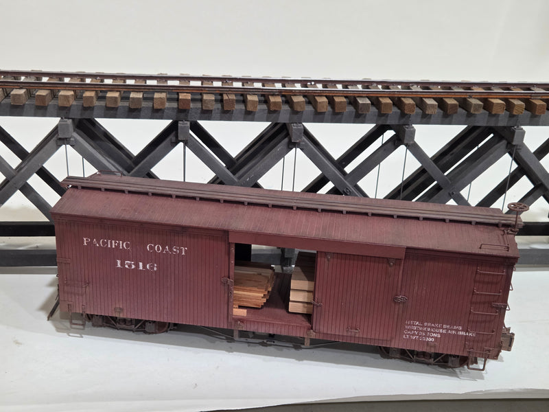 Pre-Owned Bachmann Spectrum 30' Boxcar Pacific Coast with Lumber loads