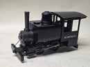 Pre-owned black steam locomotive model side view with tall chimney and EMMA logo