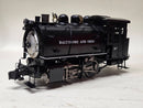 Pre-owned model steam locomotive, front three-quarter view with headlight and number 97.